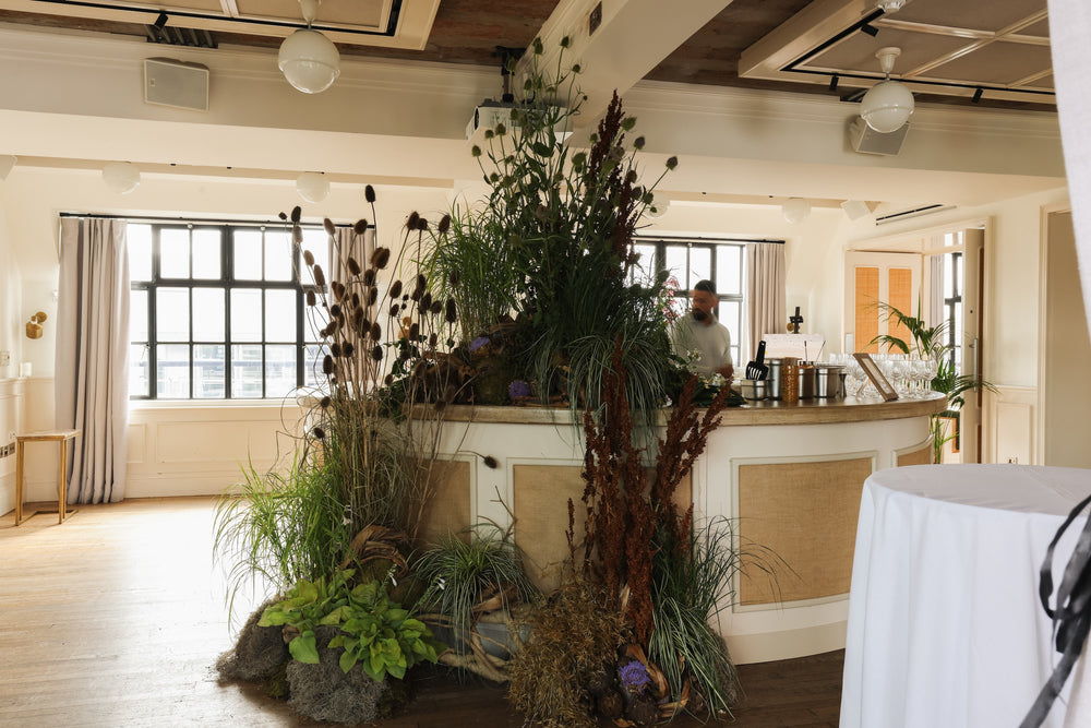 Modern interior with decorative plants on a bar to showcase event planting