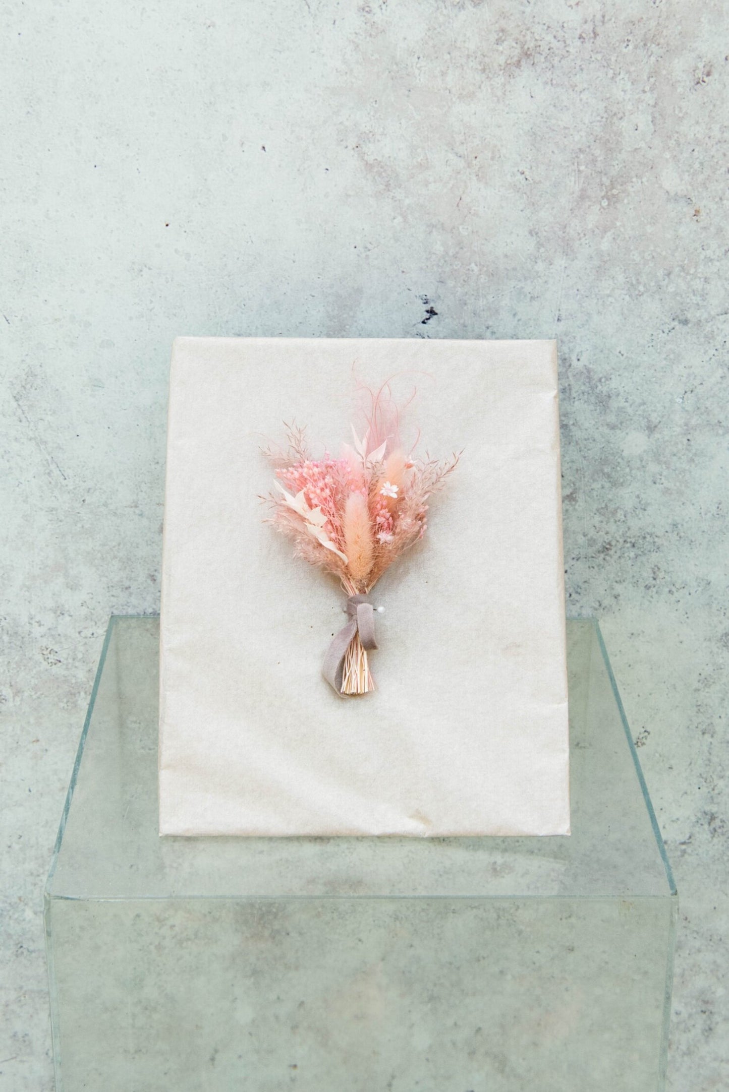 BLUSHING BRIDE GROOMS BUTTONHOLE